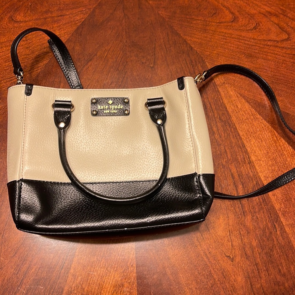 Kate Spade medium bag- used twice. No wearing marks- mint condition.